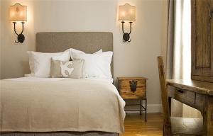a bedroom with a bed and a lamp at Hotel St Francis in Santa Fe