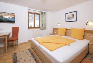 Ένα ή περισσότερα κρεβάτια σε δωμάτιο στο Haus Schlosskeller