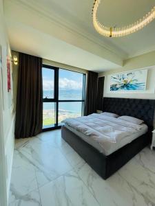 Postel nebo postele na pokoji v ubytování Balmaral Apart Hotel