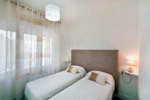 Postel nebo postele na pokoji v ubytování Incanto apartament stunning sea view