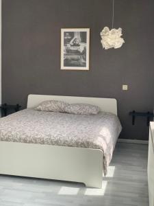 Ένα ή περισσότερα κρεβάτια σε δωμάτιο στο Anna Penthouse