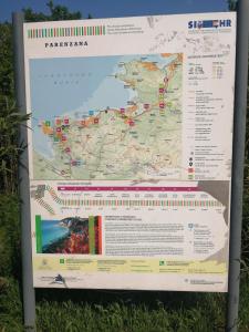 a map of pakistan on a sign in the grass at Apartma Pinea in Portorož