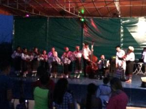 a group of people standing on a stage at DSK Hotel in Kranevo