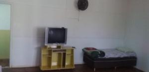 TV a/nebo společenská místnost v ubytování POUSADA DO NIVINHO