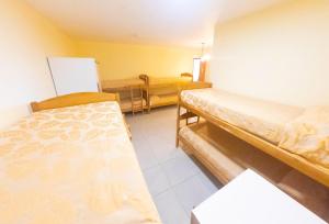 Postel nebo postele na pokoji v ubytování Matices Hostel Terminal
