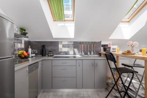 Kuchyň nebo kuchyňský kout v ubytování Apartment Palach
