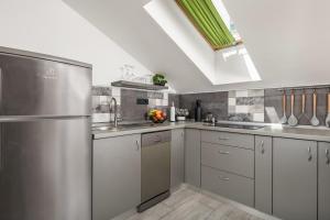 Kuchyň nebo kuchyňský kout v ubytování Apartment Palach