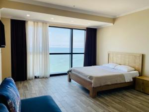 Postel nebo postele na pokoji v ubytování Balmaral Apart Hotel
