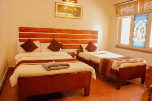 Letto o letti in una camera di Hotel ThorongLa Thamel