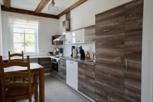 Kuchyň nebo kuchyňský kout v ubytování Familien- und Apartmenthotel Lerchenberghof