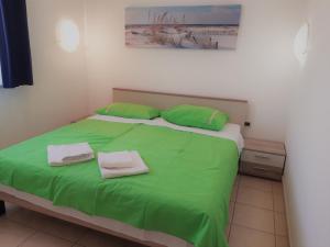 Posteľ alebo postele v izbe v ubytovaní Apartments Barbara Gregovica