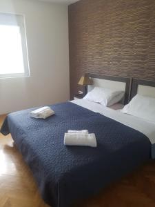 Postel nebo postele na pokoji v ubytování Apartman Playa