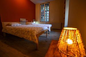 Un ou plusieurs lits dans un hébergement de l'établissement Amañi Hostel