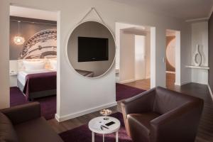 Postel nebo postele na pokoji v ubytování Dorint Kongresshotel Mannheim