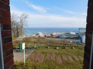 a view of the ocean from a building at Seelotsenstation Sassnitz mit Hafenblick by Unsere Urlaubszeit in Sassnitz