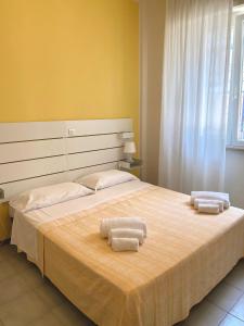 Postel nebo postele na pokoji v ubytování HOTEL FLYING