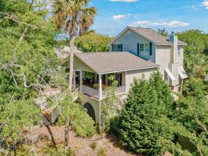 an aerial view of a house with a palm tree at 307 W Indian - The Prickly Pear in Folly Beach