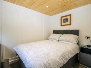 Кровать или кровати в номере Harvest Lodge