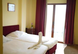 Posteľ alebo postele v izbe v ubytovaní Das Hostal