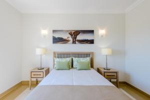 Postel nebo postele na pokoji v ubytování Boavista Golf and Spa Resort - Bayview