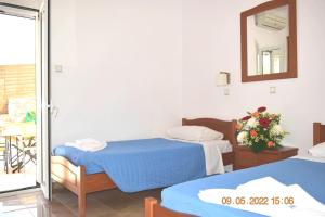 Postel nebo postele na pokoji v ubytování Istron MiraBella Villas