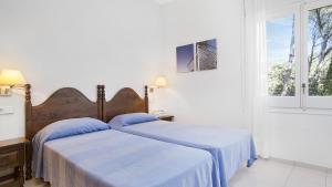 Posteľ alebo postele v izbe v ubytovaní Villa Care Pl - Llafranc