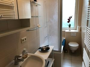 Koupelna v ubytování City Quartier Jena + 40 fotografií
