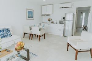 A cozinha ou cozinha compacta de Beachfront Bella Horizonte 5