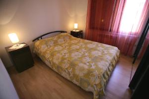 Posteľ alebo postele v izbe v ubytovaní House Peri