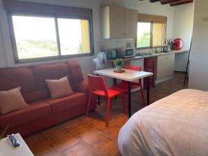 A kitchen or kitchenette at Air Conditioned "Casa Tropicana" Entire Villa or Individual Apartments
