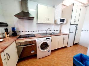 A kitchen or kitchenette at CASA DE LA PLAYA: La Cala de Mijas