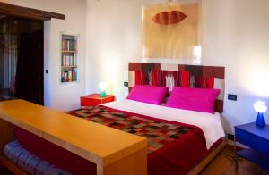 Un pat sau paturi într-o cameră la Casa Isotta