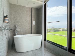 Bilik mandi di 鬧鐘關掉旅店 Alarm Off B&B