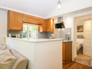 A kitchen or kitchenette at Orchard Lodge