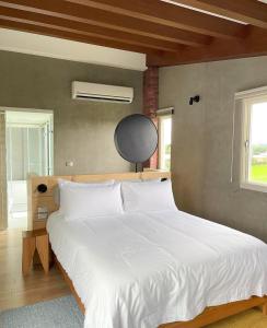 Katil atau katil-katil dalam bilik di 鬧鐘關掉旅店 Alarm Off B&B