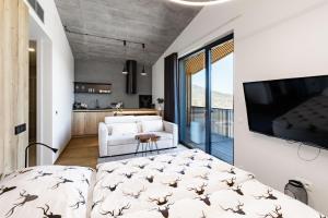 Postel nebo postele na pokoji v ubytování Apartmán v Tee house Čeladná