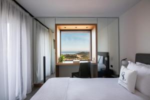 Posteľ alebo postele v izbe v ubytovaní Sivota Legacy Luxury Villas