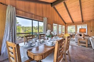a dining room with a table and chairs at Calm Groveland Cabin - Near Pine Mountain Lake! in Groveland