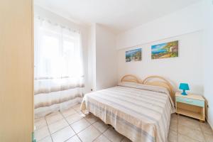 Postel nebo postele na pokoji v ubytování Villa Sunset