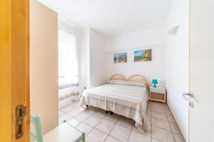 Postel nebo postele na pokoji v ubytování Villa Sunset