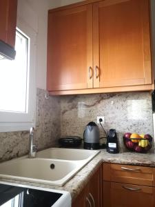 A kitchen or kitchenette at Casa Plumeria at Gouves Beach