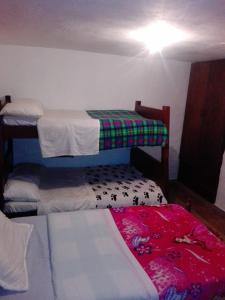 Postel nebo postele na pokoji v ubytování Finca Hotel El Paraíso