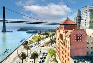 a large building with a clock tower on top of it at Harbor Court Hotel in San Francisco