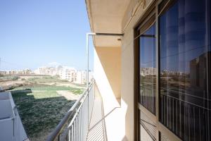 En balkon eller terrasse på Marsalforn Apartment