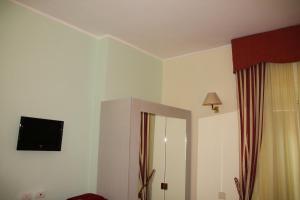 TV a/nebo společenská místnost v ubytování Hotel Rio