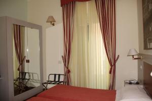 Postel nebo postele na pokoji v ubytování Hotel Rio