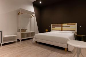 Posteľ alebo postele v izbe v ubytovaní Adrian's B&B