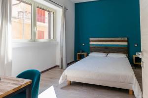 Posteľ alebo postele v izbe v ubytovaní Adrian's B&B