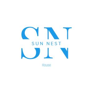 a logo for the sun nest house at SUN NEST HOUSE in Skopelos Town