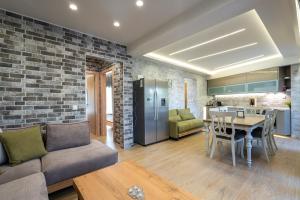 Kuchyň nebo kuchyňský kout v ubytování Family Apartment Zornitsa